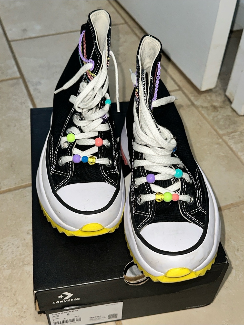 Converse  Black Canvas High-Top Sneakers with White Laces and Yellow Sole